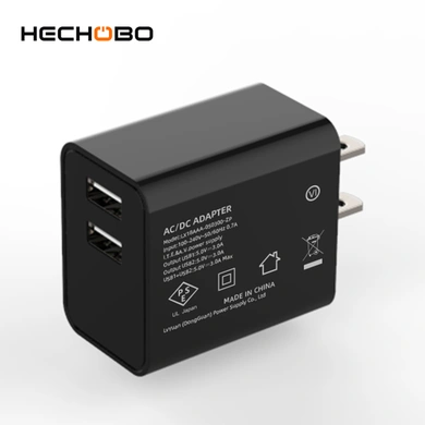 The 2 port USB charger is a versatile and efficient device that comes with two USB ports, enabling simultaneous charging of multiple devices through a power outlet with high power output and fast charging speeds.